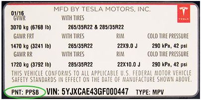 Tesla – Inside driver’s door jamb
